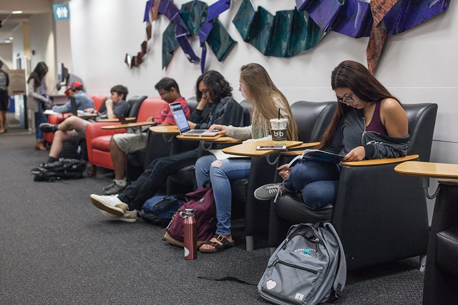 Students hard at work in the Malcolm A. Love Library.