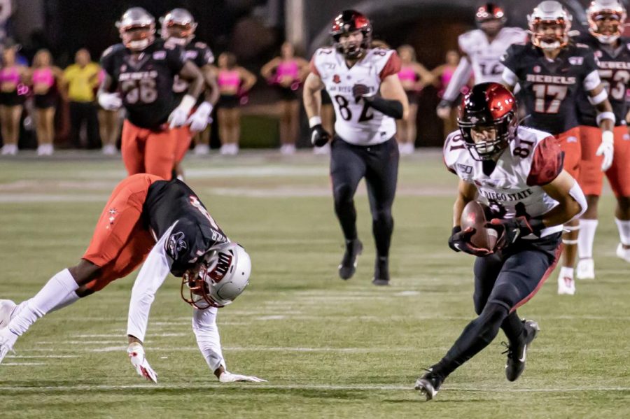Sophomore wide receiver Ethan Dedeaux catches a 49-yard touchdown in the Aztecs' 20-17 win over UNLV on Oct. 26 at Sam Boyd Stadium in Las Vegas.