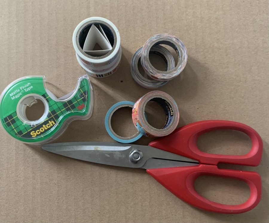 Some tape (or washi tape) and a pair of scissors can do you all the wonders and allow you to create fun, yet, useful things for your new room. 