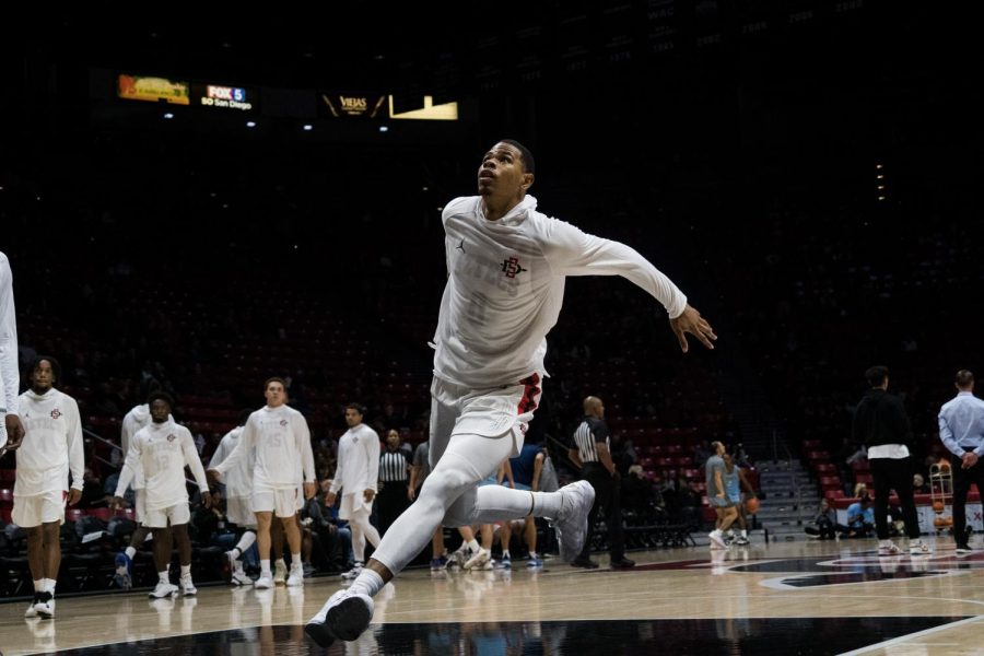 Senior Keshad Johnson prepares for a pregame dunk on Nov. 1, 2022. 