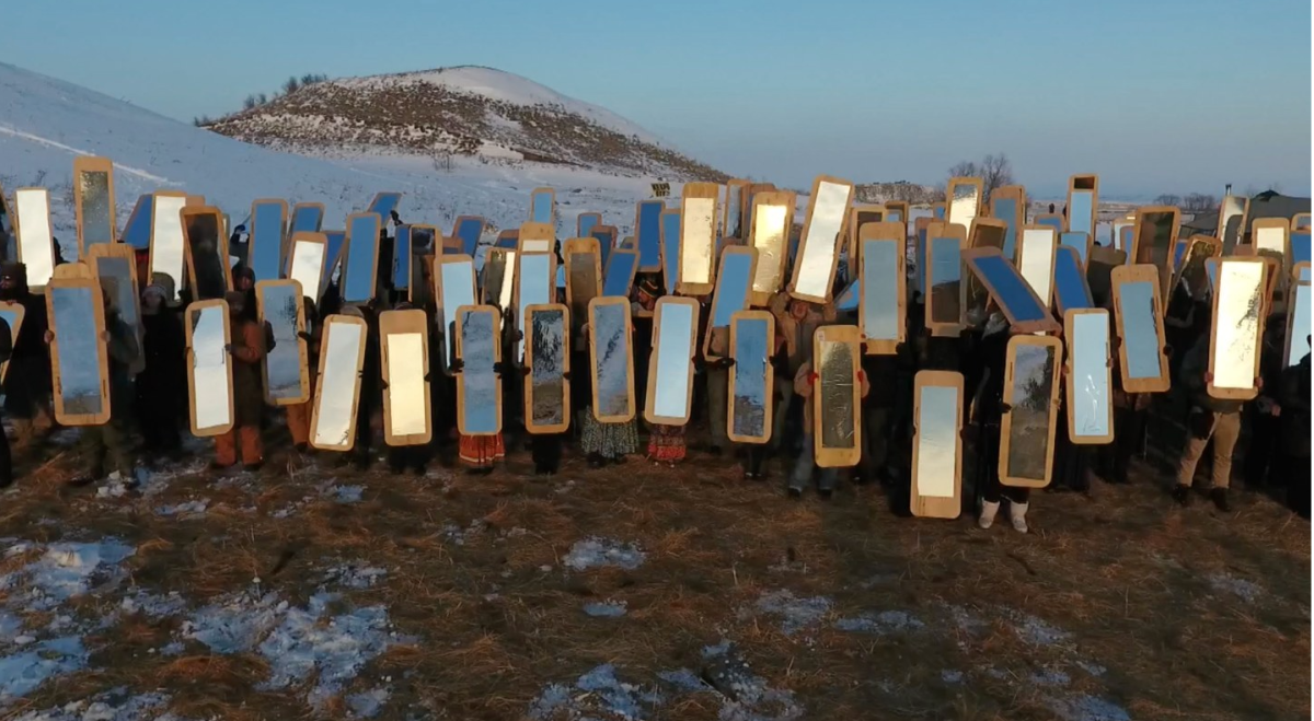 Cannupa Hanska Luger's Mirror Shield Project was performed at Oceti Sakowin Camp, Standing Rock in 2016. Photo courtesy of Cannupa Hanska Luger