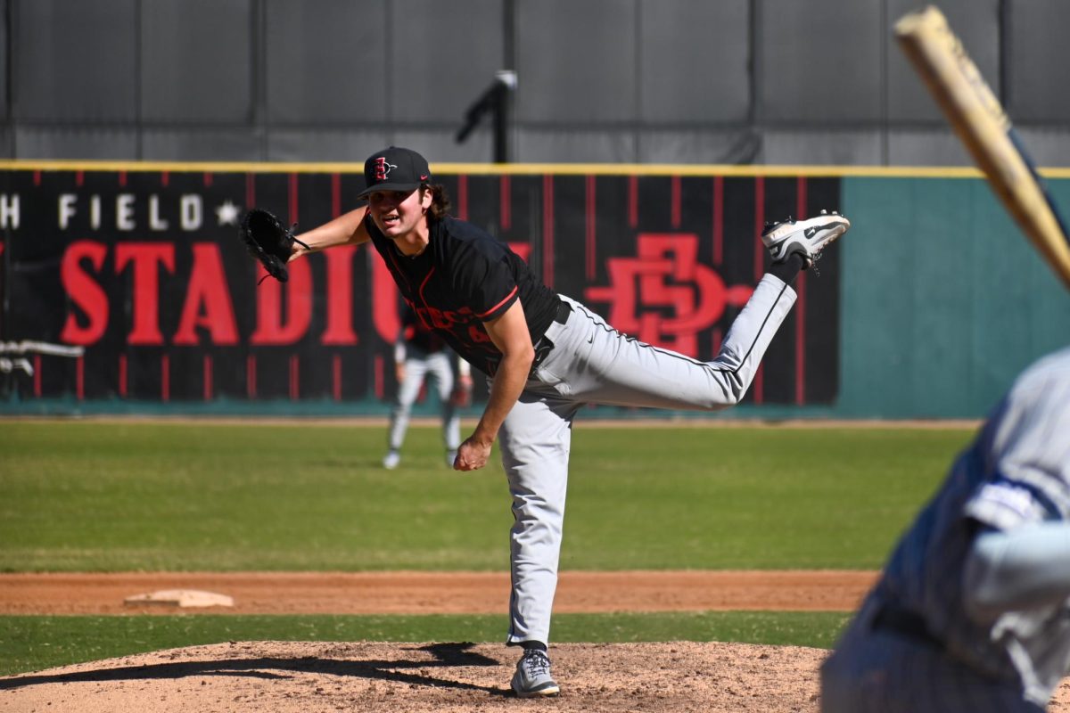 Sophomore Garvey Rumary makes a pitch to the batter