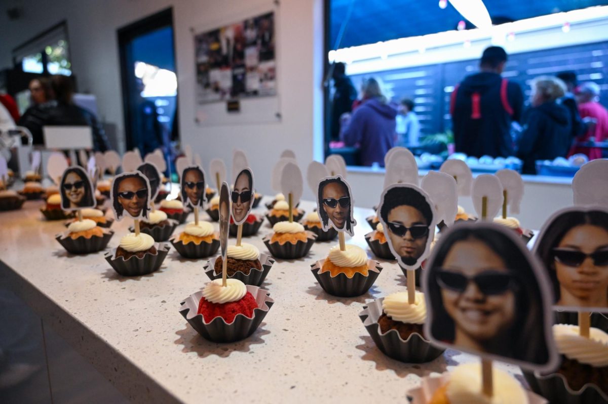 Mini bundt cakes with San Diego State Basketball players faces decorate a counter at the Blenders NIL Event on Sun. March 1, 2025 at Blenders HQ.