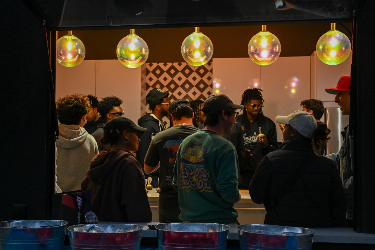 Players and event atendees mingle at  the Blenders NIL Event on Sun. March 1, 2025 at Blenders HQ.