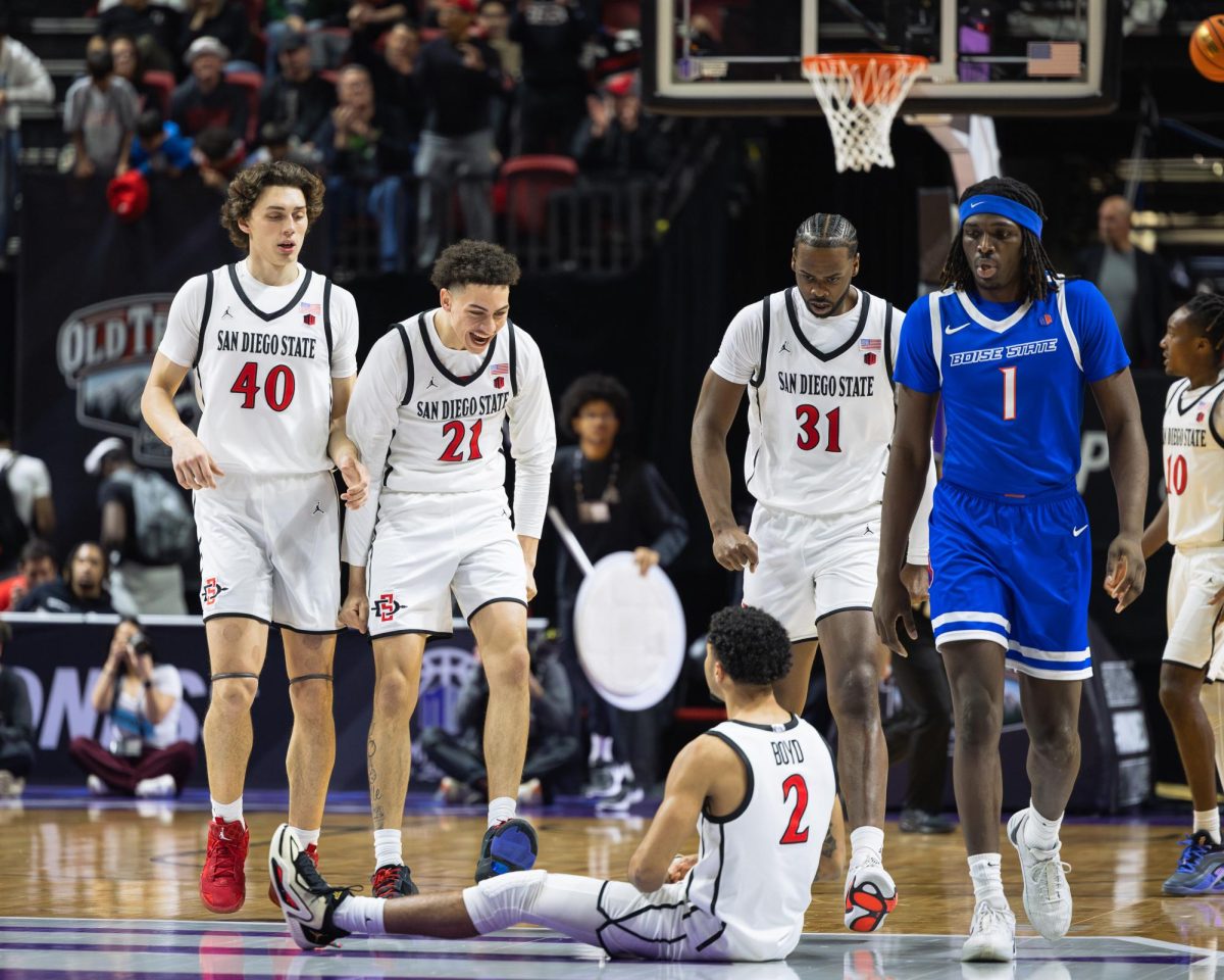 Guard Nick Boyd is energized by his teammates during SDSUs quarterfinal matchup against Boise State on Mar. 13, 2025.