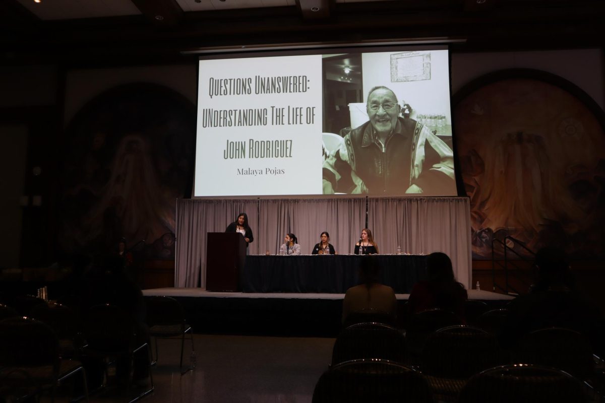Third-year, Communications and American Indians double-major, Malaya Pojas introduces the presentation about her great-grandfather on Friday, March 7, 2025, at San Diego State University Montezuma Hall.